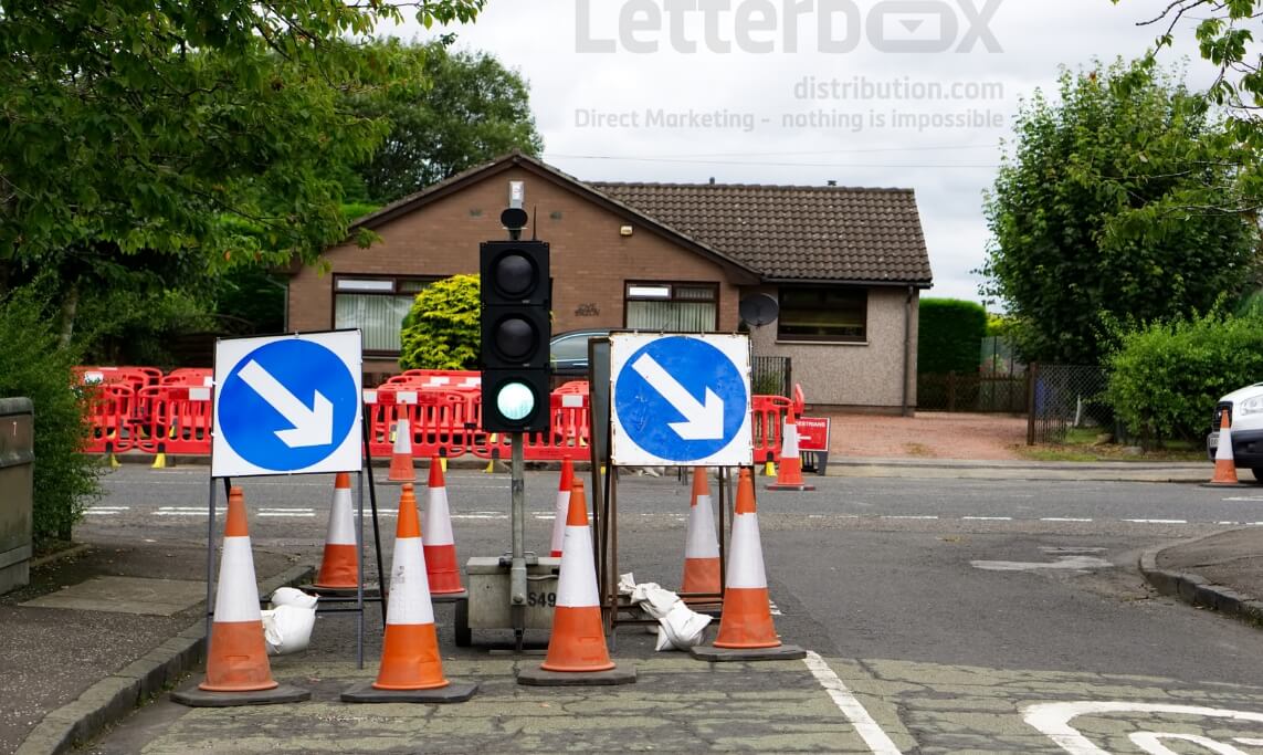 temporary lights signify roadworks are present on this road